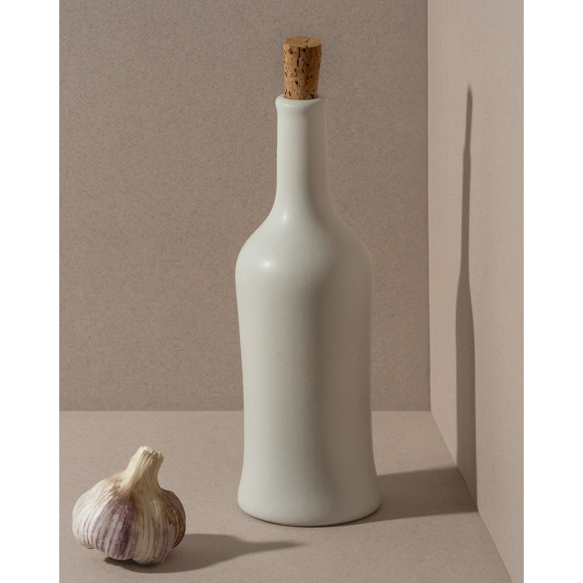 Gharyan Brutto stoneware olive oil bottle in matte white, 21 oz, Patina Vancouver