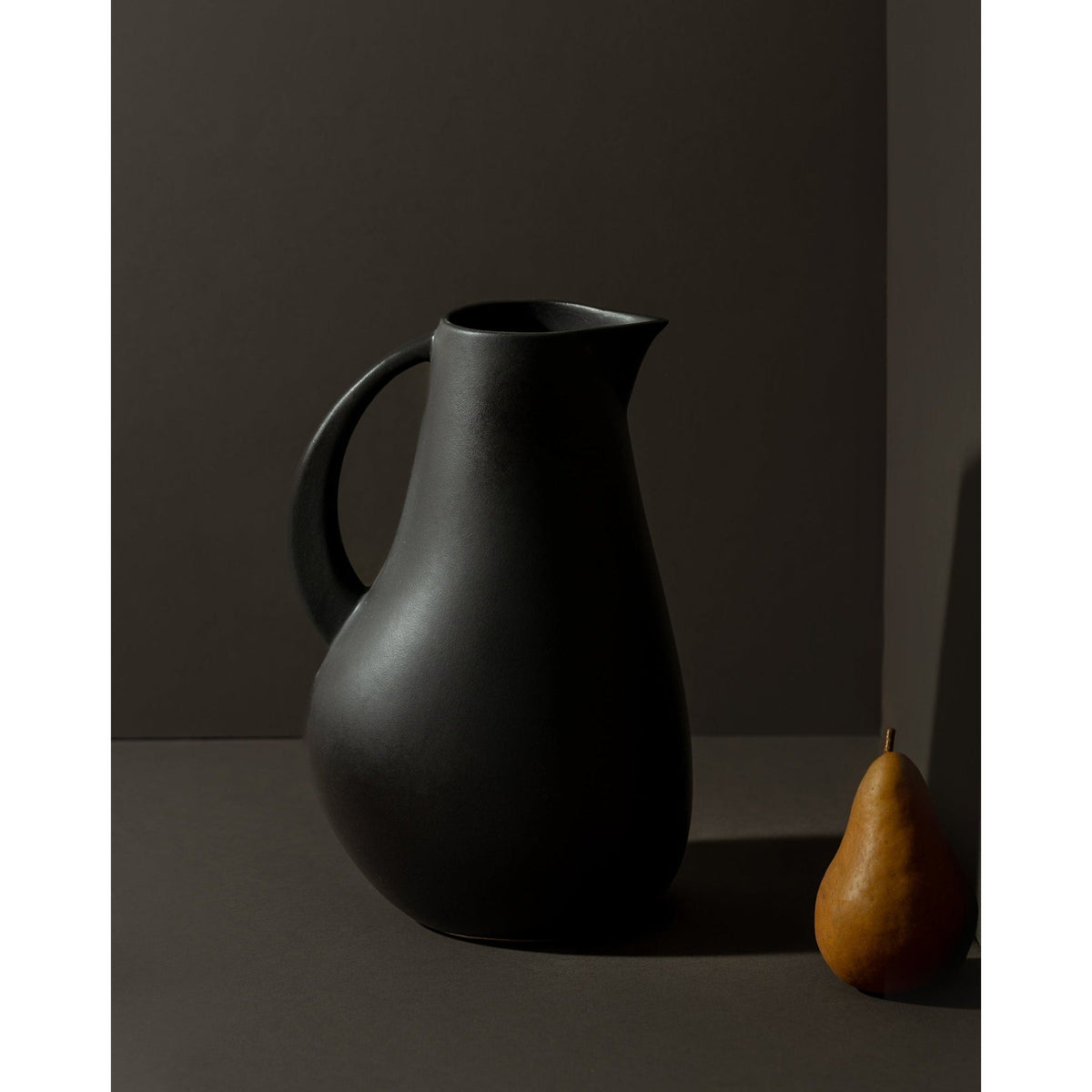 Gharyan Kuduo stoneware pitcher in matte black with a bold sculptural silhouette, 64 oz, Patina Vancouver