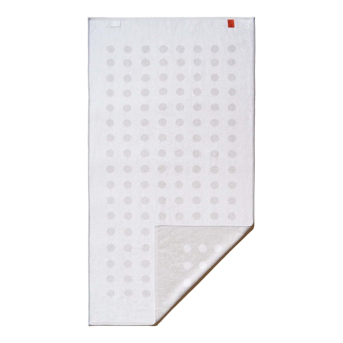 Typical Towels polka dot towel in ceramic clay and workshop white, Patina Vancouver