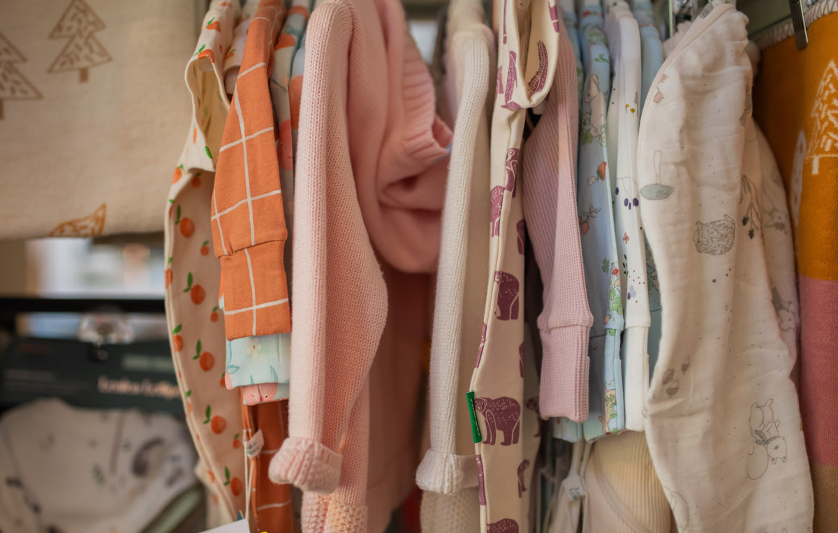 Baby clothes and soft toys at Patina Home Interiors in Whistler