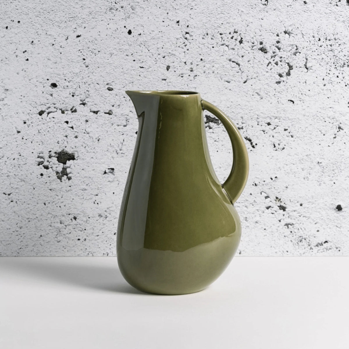Gharyan Kuduo stoneware pitcher in glazed green, Patina Vancouver