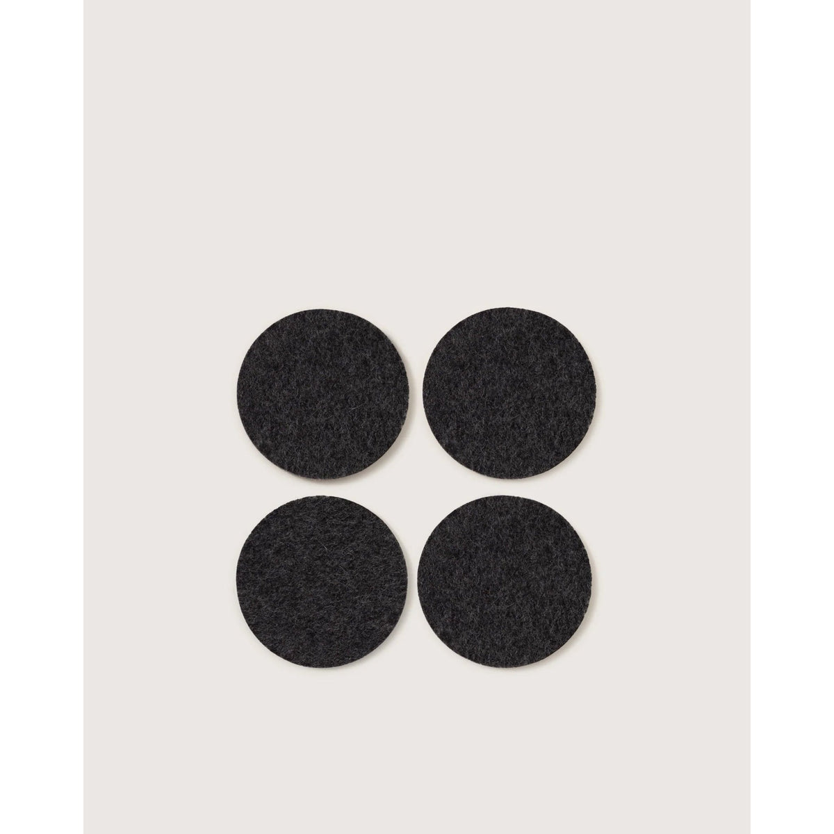 Graf Lantz round merino wool felt coasters in charcoal, set of 4, Patina Vancouver