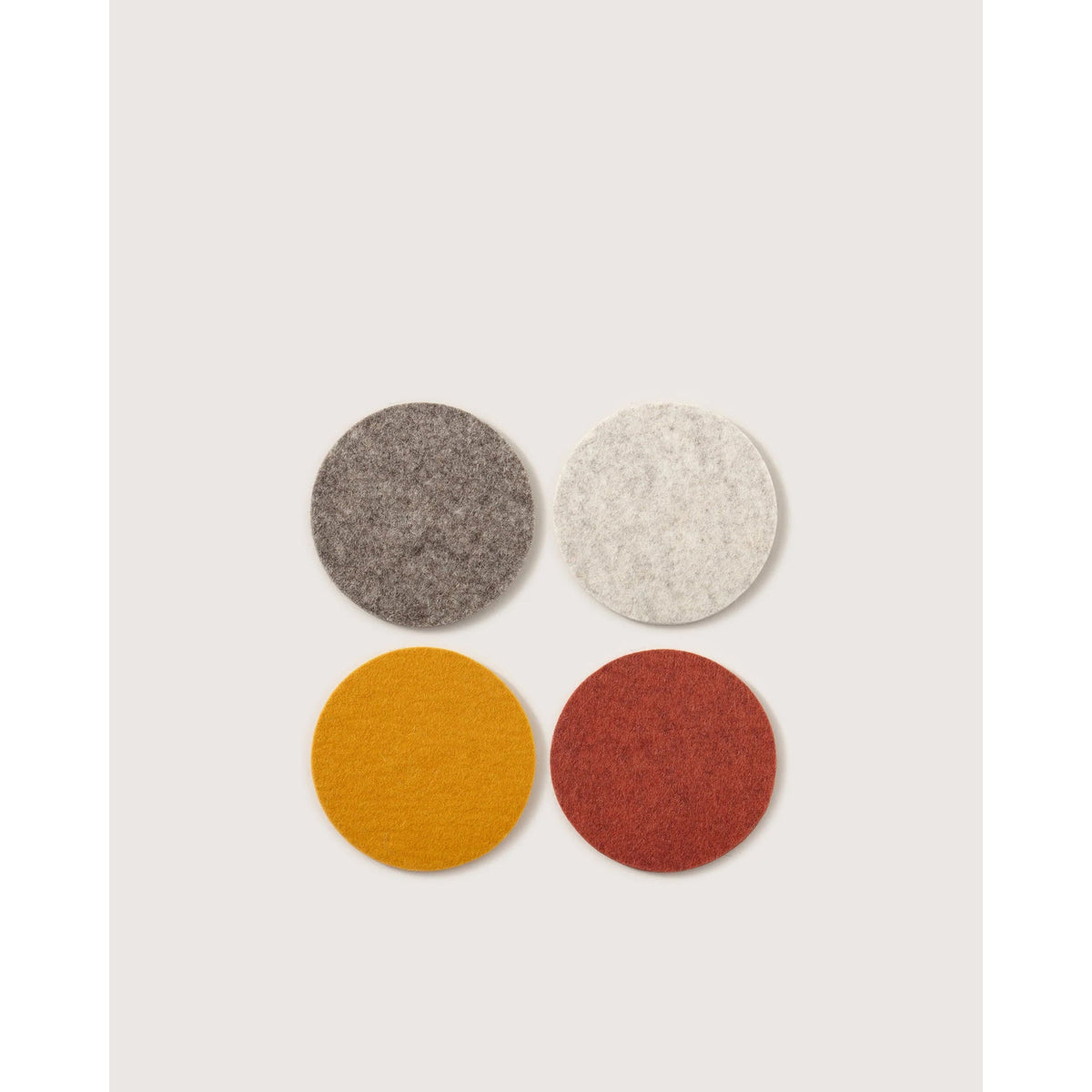 Graf Lantz round merino wool felt coasters in Desert Sun, set of 4, Patina Vancouver