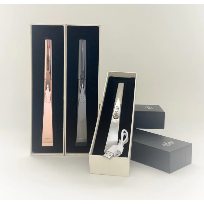 Sizzle Lighters Sleek USB rechargeable lighter in rose gold metal, Patina Vancouver