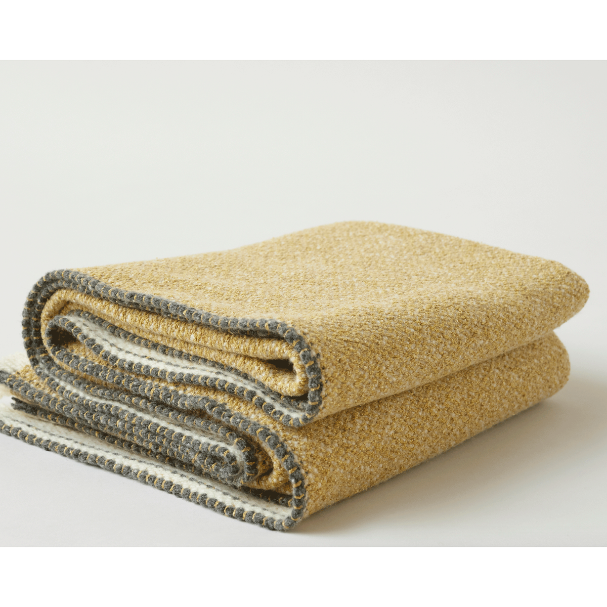 Teixidors Hydra handwoven merino and silk throw in mustard, 140 x 180 cm, Patina Vancouver